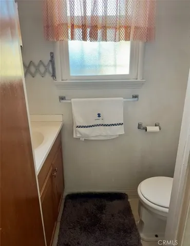 a bathroom with a sink and a toilet