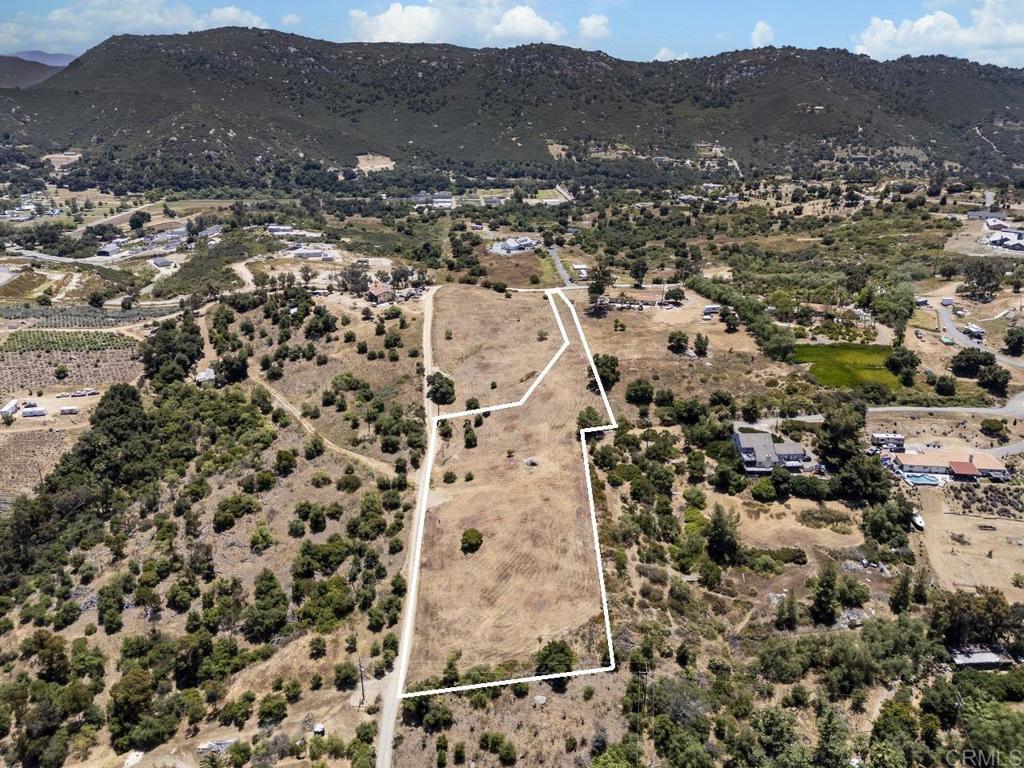 15626 Mathew Road Valley Center, CA 92082 - Photo 6 of 8 an aerial view of residential house and sandy dunes