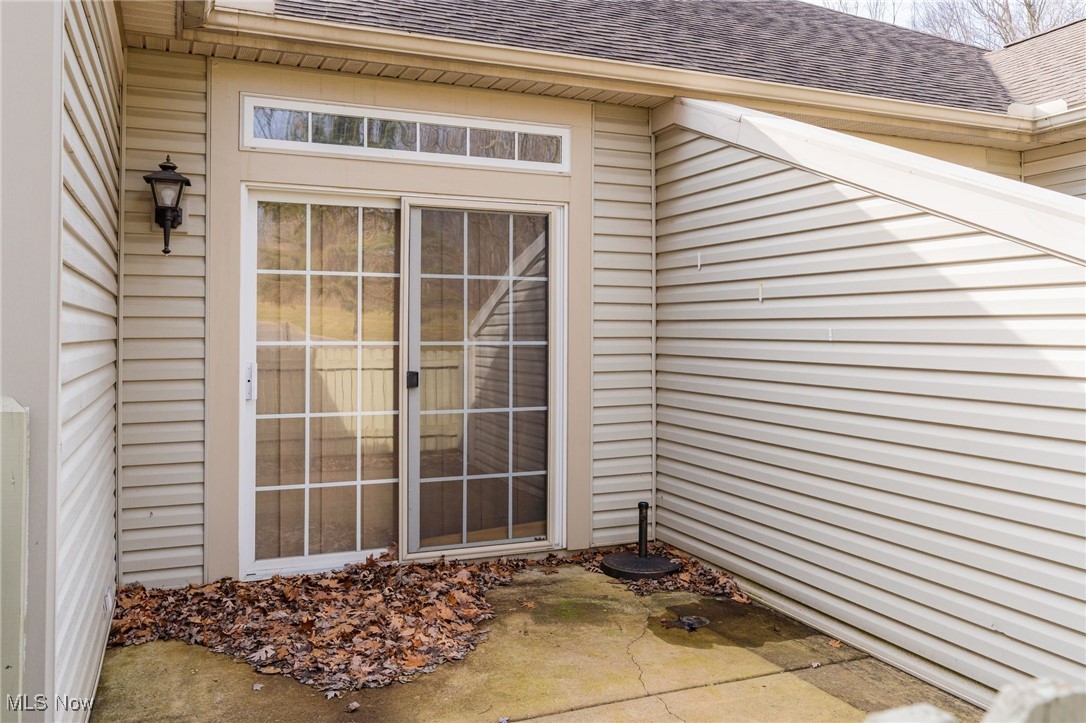 142 Wilcox Road Youngstown, OH 44515 - Photo 25 of 36 Property entrance with a shingled roof