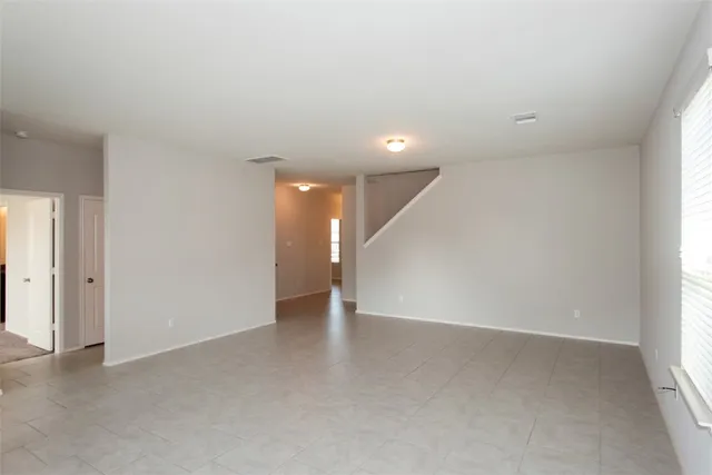 an empty room with a natural light