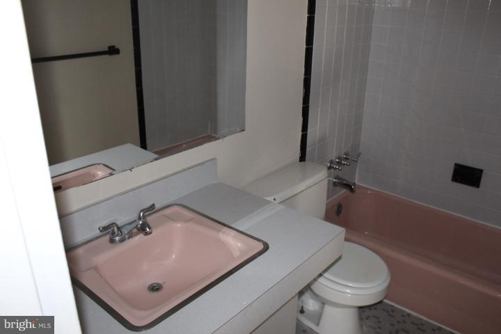 1316 Ray Road Hyattsville, MD 20782 - Photo 22 of 27 a bathroom with a sink and a toilet