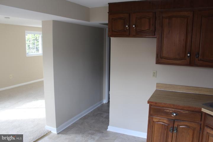 1316 Ray Road Hyattsville, MD 20782 - Photo 8 of 27 a view of cabinets and wooden floor