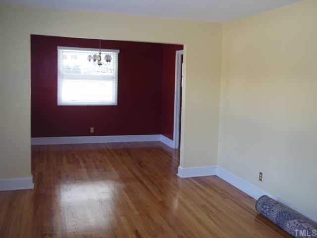 3704 Lee Road Raleigh, NC 27604 - Photo 11 of 12 a view of a room with wooden floor and a window