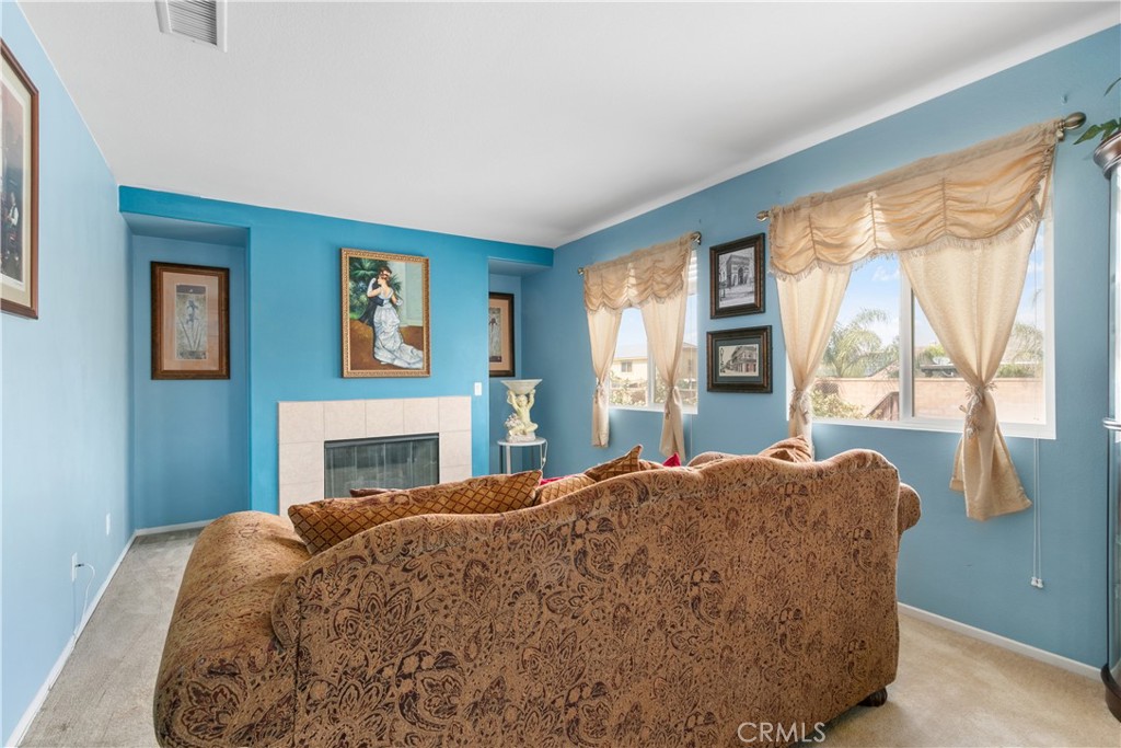 37192 High Ridge Drive Beaumont, CA 92223 - Photo 30 of 71 a large bed sitting in a bedroom next to a window