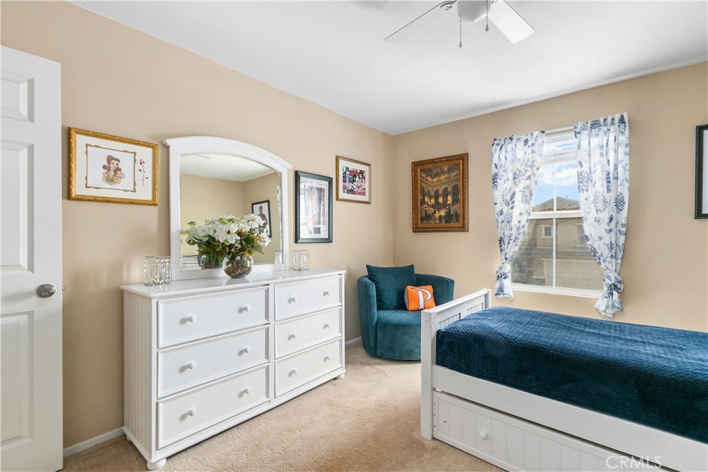 37192 High Ridge Drive Beaumont, CA 92223 - Photo 40 of 71 a living room with furniture and a dresser