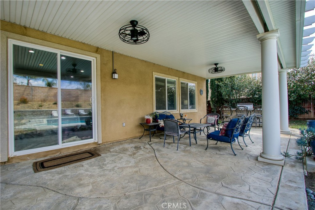 37192 High Ridge Drive Beaumont, CA 92223 - Photo 46 of 71 a view of a lobby with chair and glass door