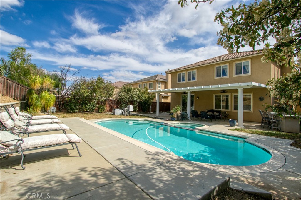 37192 High Ridge Drive Beaumont, CA 92223 - Photo 57 of 71 a view of a house with swimming pool and sitting area