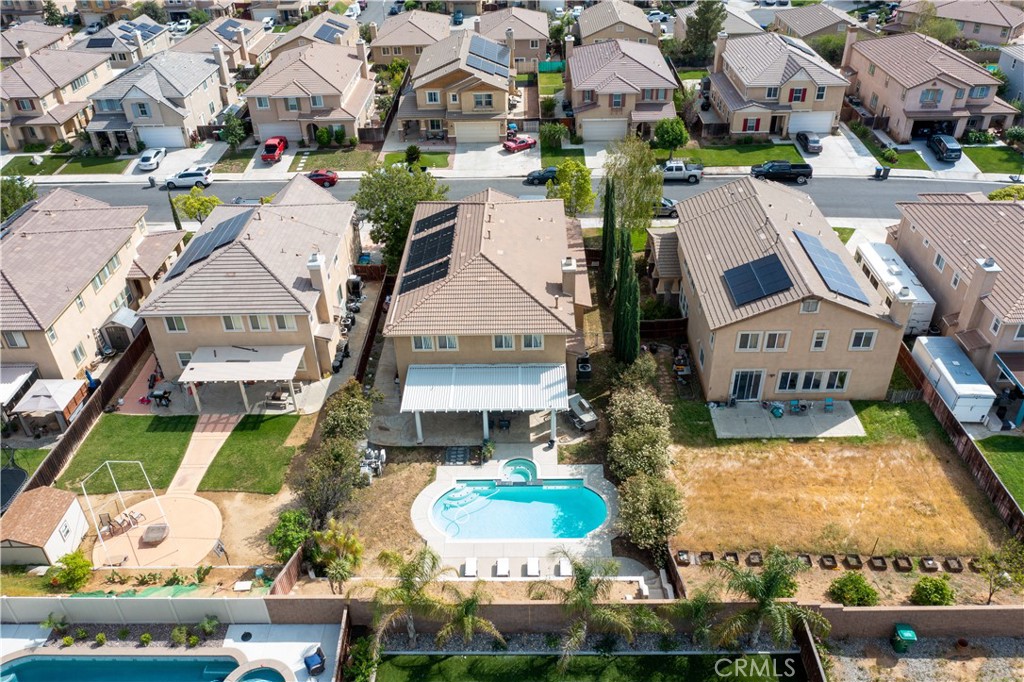 37192 High Ridge Drive Beaumont, CA 92223 - Photo 67 of 71 an aerial view of residential houses with outdoor space and parking