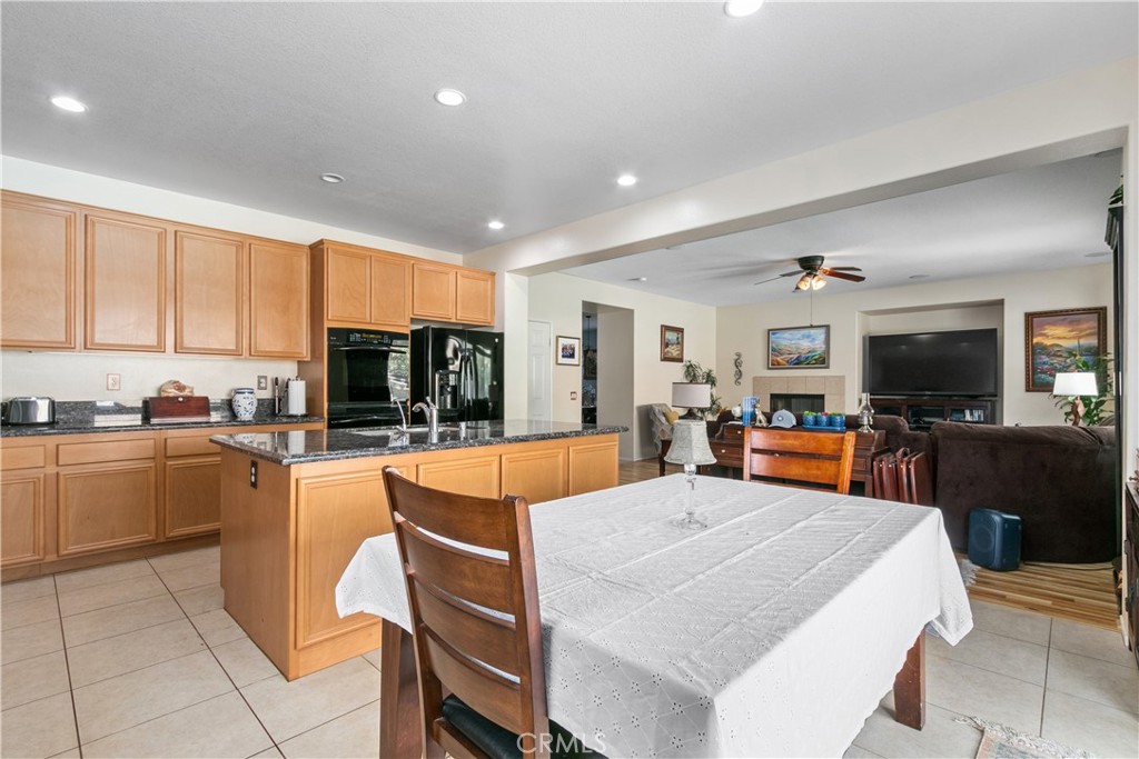 37192 High Ridge Drive Beaumont, CA 92223 - Photo 10 of 71 a large kitchen with sink a counter top space and stainless steel appliances