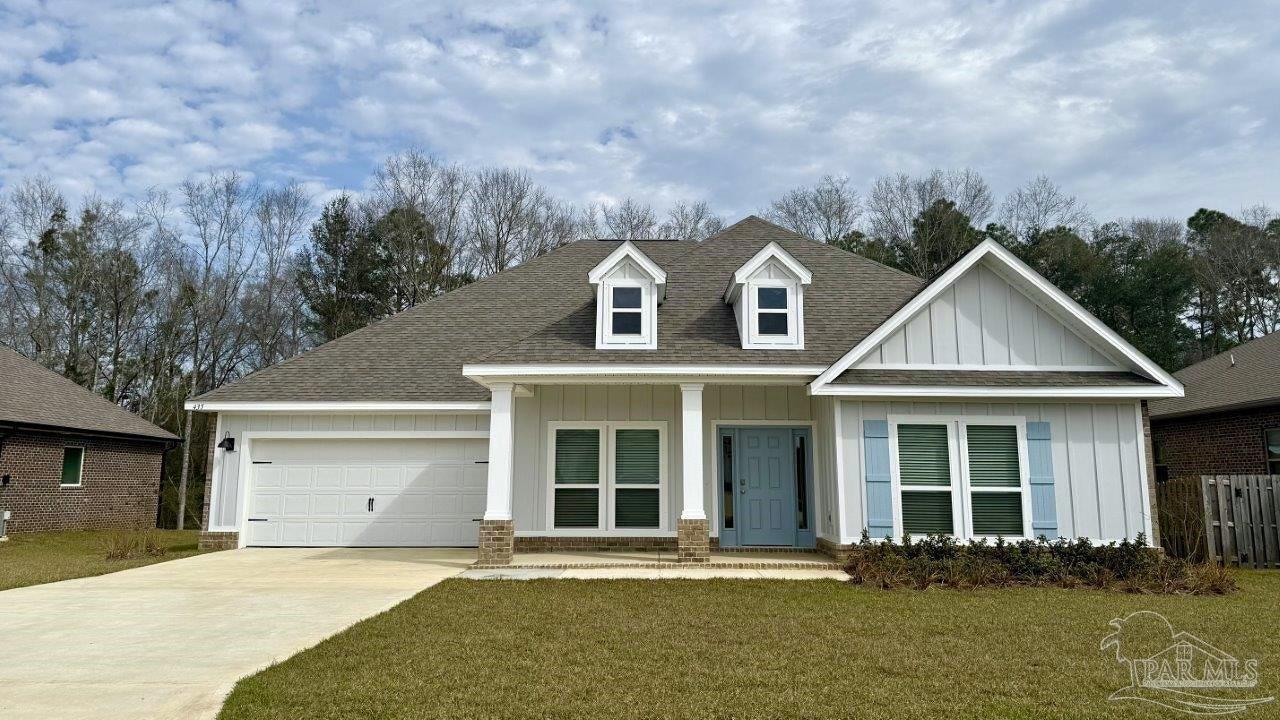 435 Connie Way Cantonment, FL 32533 - Photo 1 of 17 front view of a house with a yard