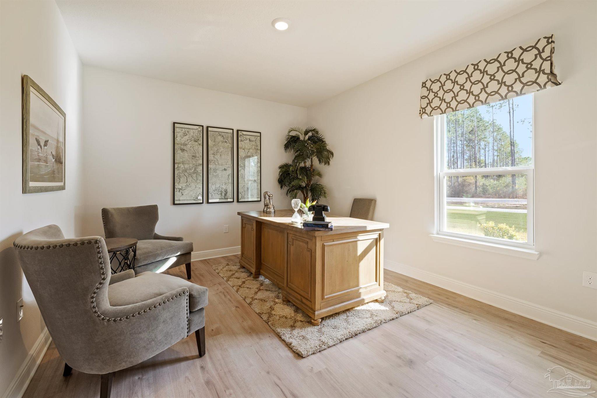 435 Connie Way Cantonment, FL 32533 - Photo 7 of 17 a living room with furniture and a window