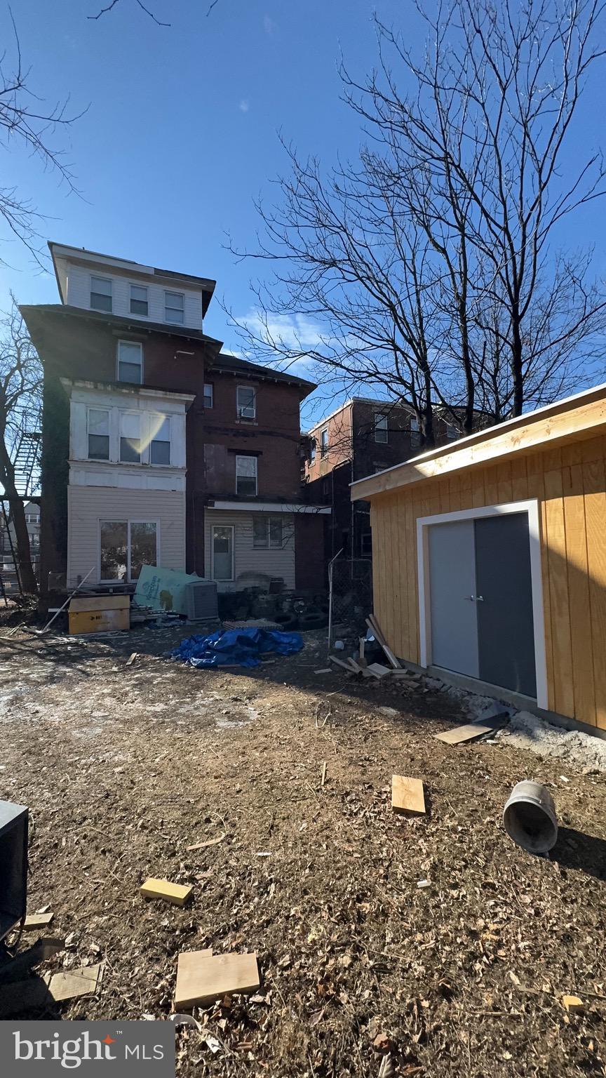 5015 Pine Street Philadelphia, PA 19143 - Photo 14 of 14 a view of a house with a yard