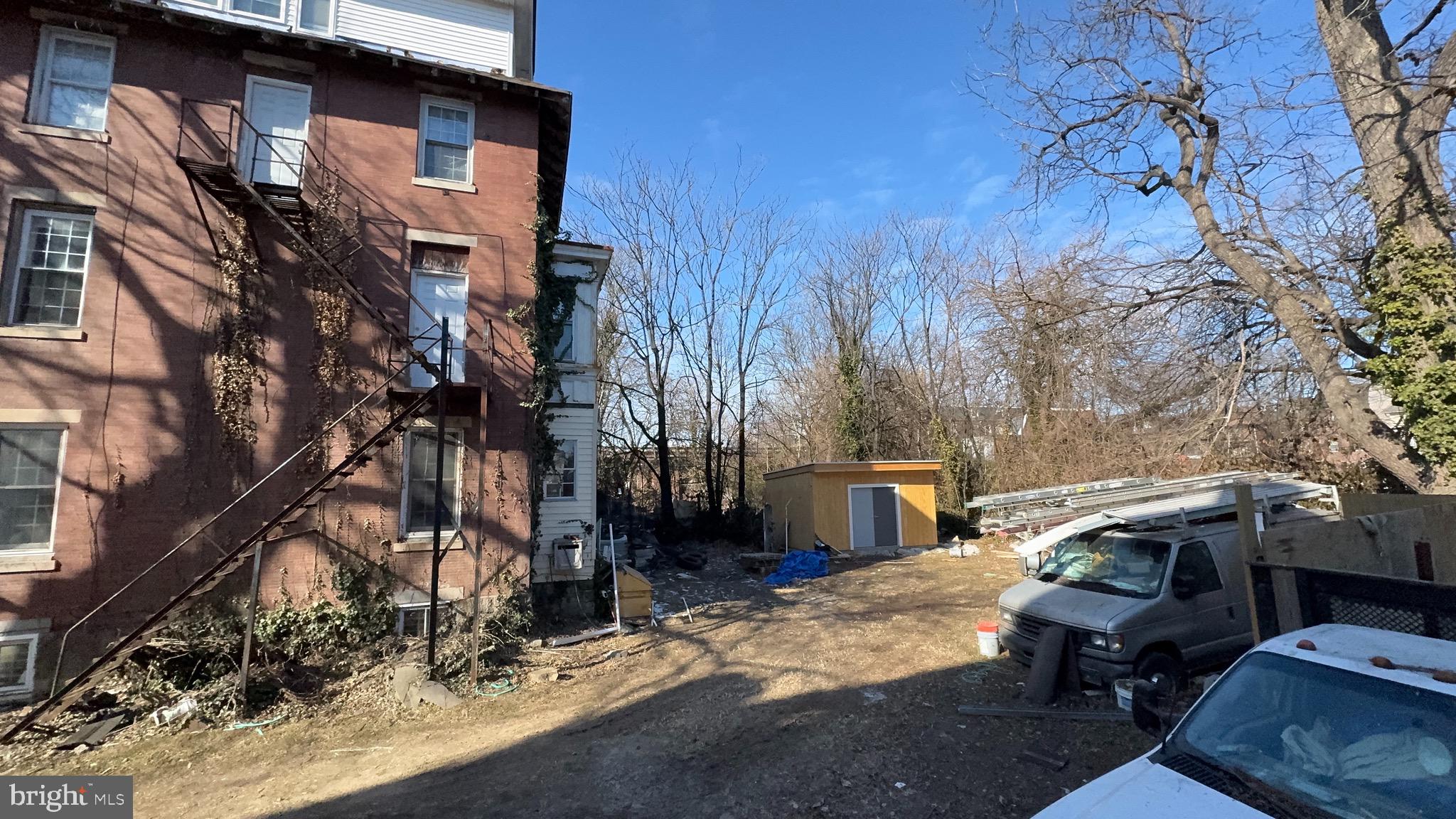 5015 Pine Street Philadelphia, PA 19143 - Photo 6 of 14 a view of a house with a patio