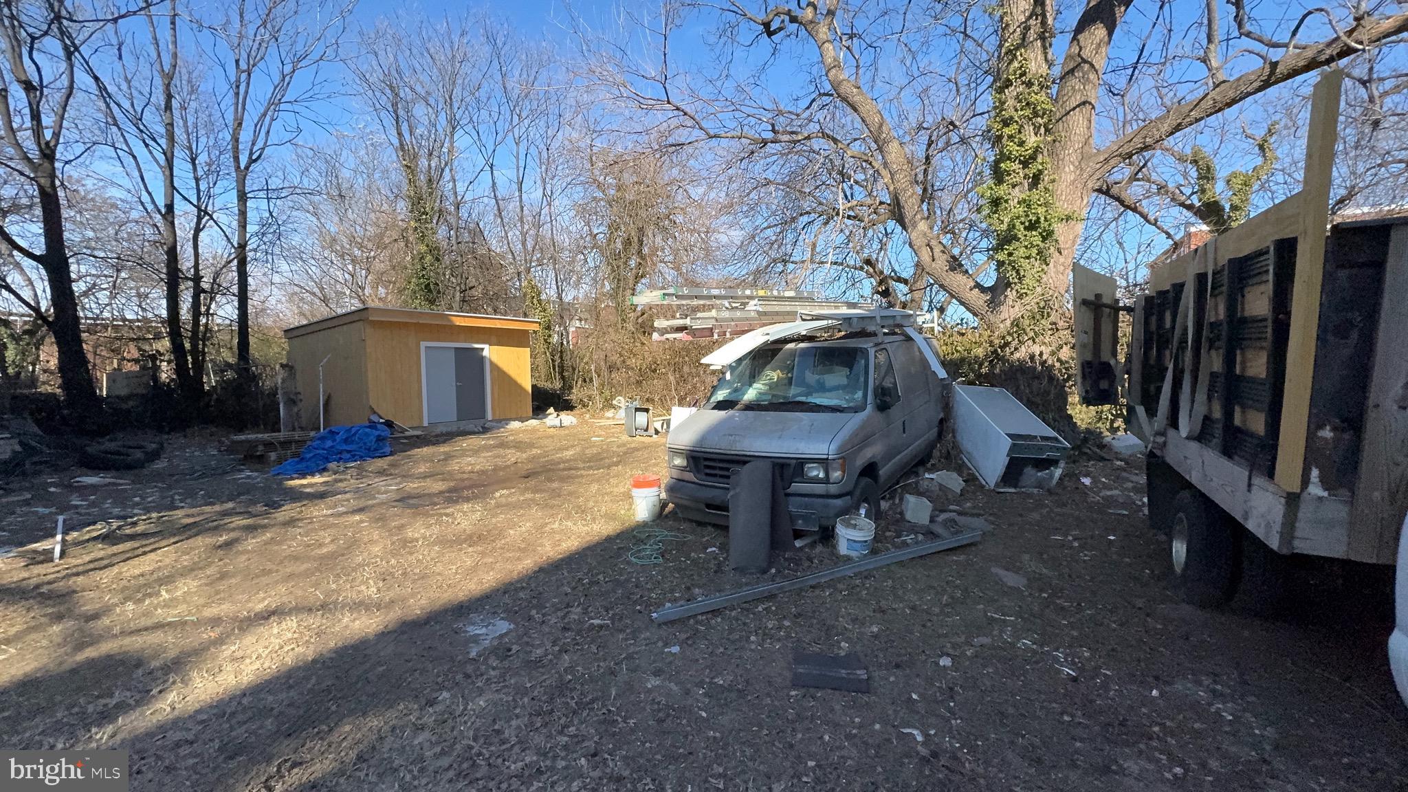 5015 Pine Street Philadelphia, PA 19143 - Photo 9 of 14 a view of a house with backyard and sitting area