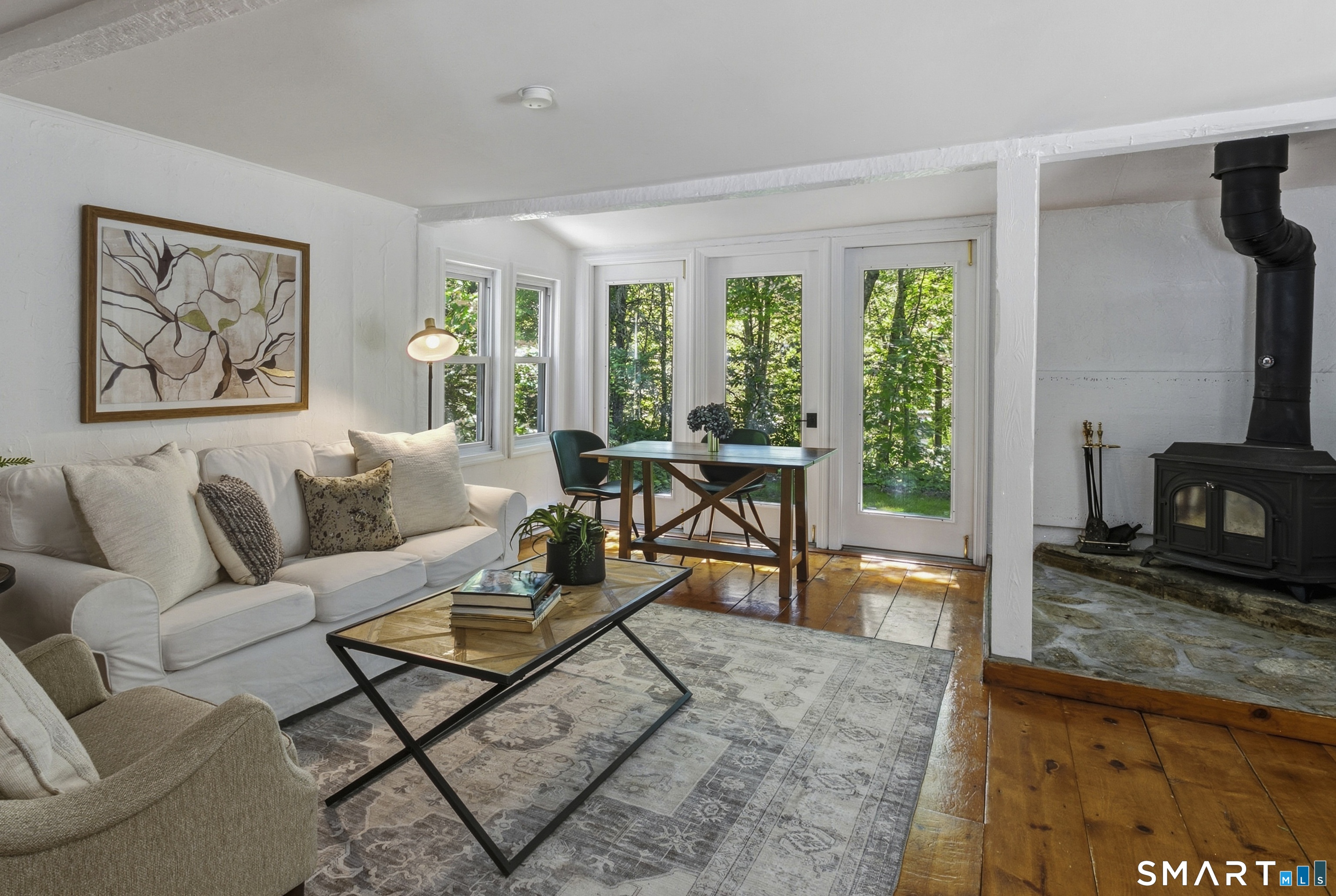188 Bacon Road Roxbury, CT 06783 - Photo 3 of 33 a living room with furniture and a flat screen tv