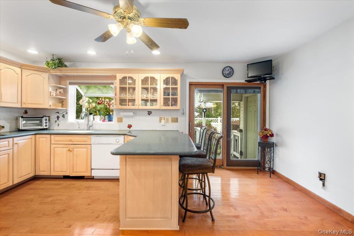 4 Briary Road Dobbs Ferry, NY 10522 - Photo 9 of 29 From the kitchen enjoy easy access to the outdoor deck and backyard via sliding glass doors.