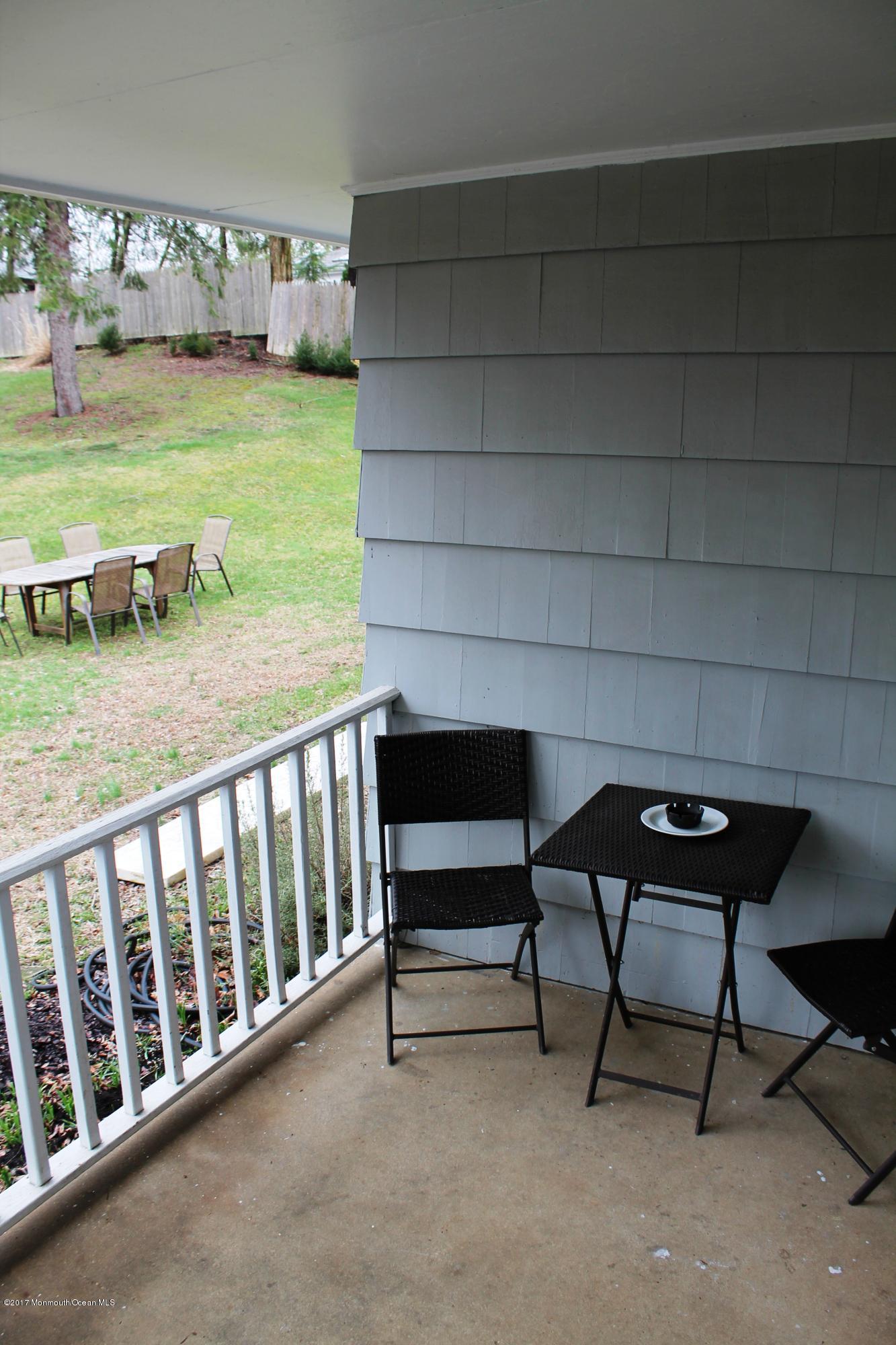 391 Tennent Road Morganville, NJ 07751 - Photo 29 of 31 porch in back