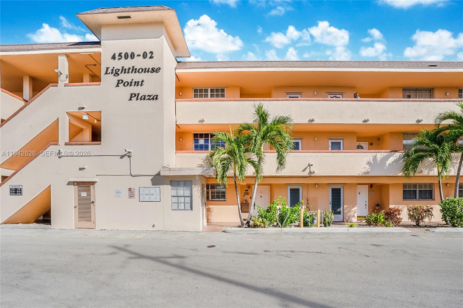 4502 North Federal Highway, Unit 334D Lighthouse Point, FL 33064 - Photo 2 of 15 a front view of a building with ocean view