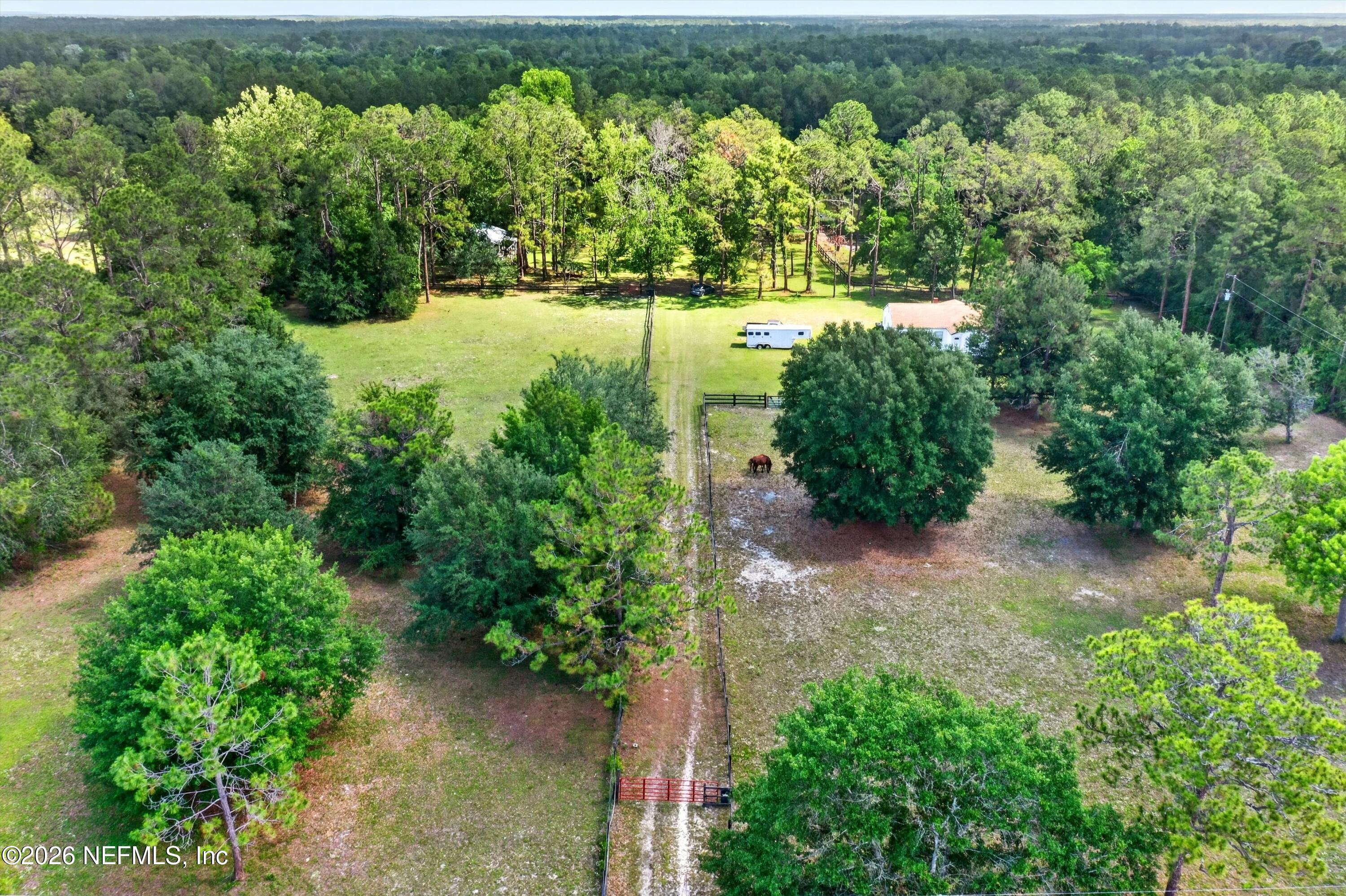 5214 Carter Spencer Road Middleburg, FL 32068 - Photo 47 of 50 an aerial view of a houses with yard