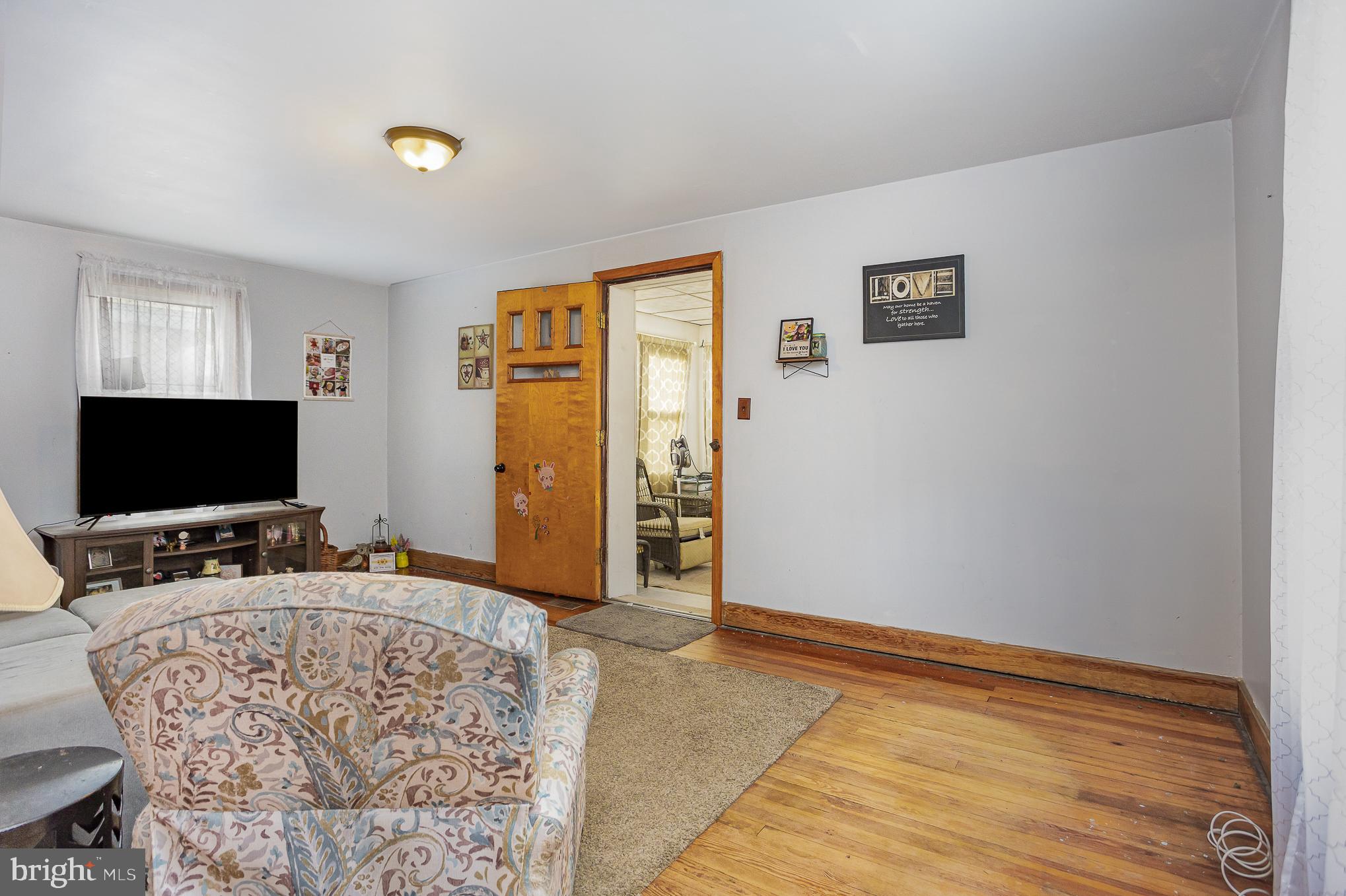 63 Kinship Road Dundalk, MD 21222 - Photo 4 of 16 Living Room w/ hardwood