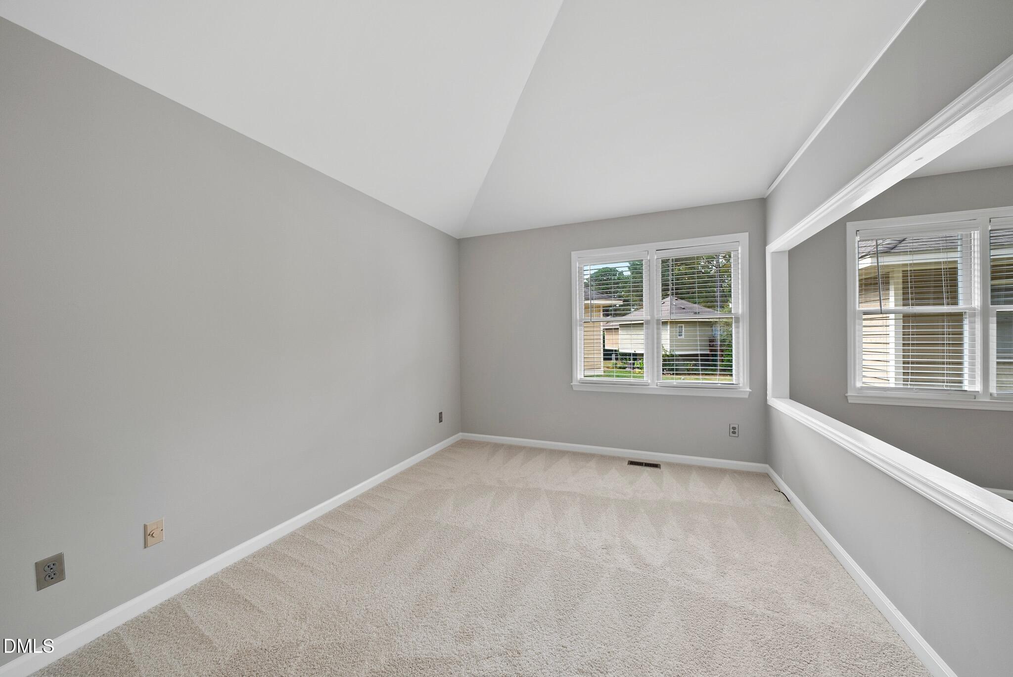 3634 Mill Run Raleigh, NC 27612 - Photo 12 of 18 an empty room with windows