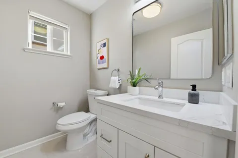 a bathroom with a shower and a sink