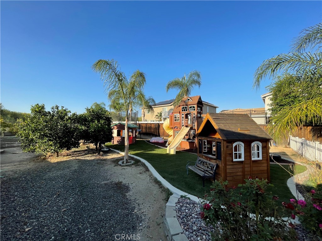 42249 CLAIRISSA Way Murrieta, CA 92562 - Photo 12 of 47 an aerial view of a house with garden space and street view
