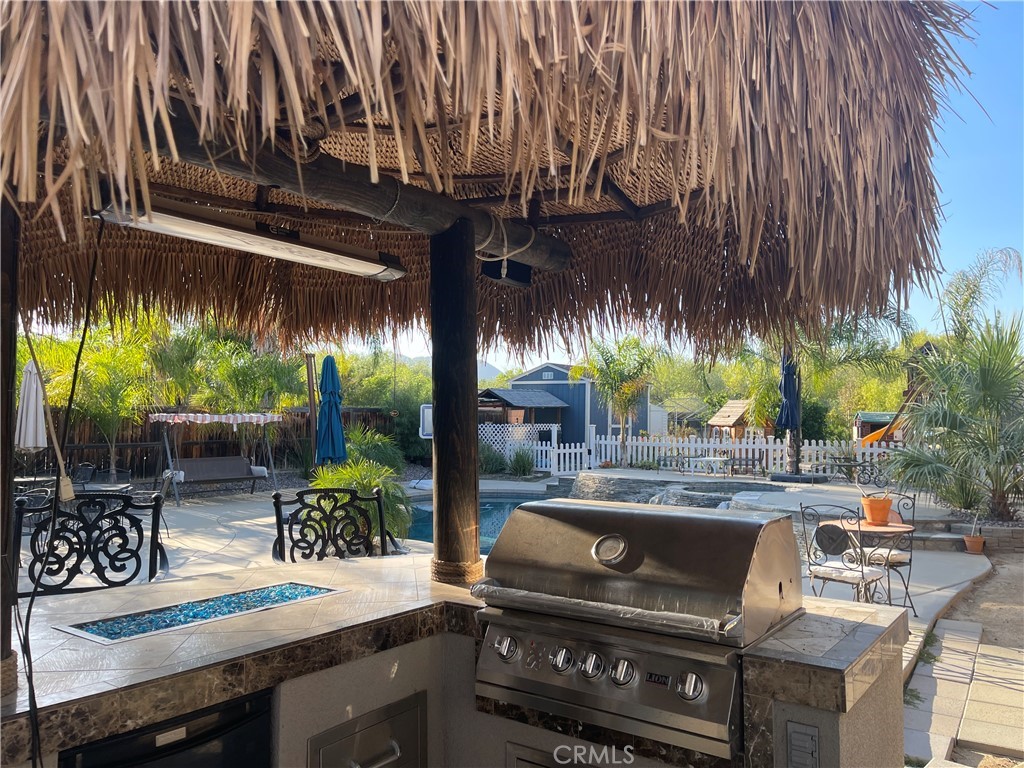 42249 CLAIRISSA Way Murrieta, CA 92562 - Photo 22 of 47 a view of a chairs and table in a patio