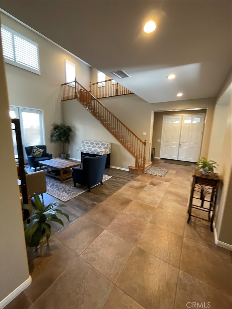 42249 CLAIRISSA Way Murrieta, CA 92562 - Photo 23 of 47 a lobby with furniture and a potted plant