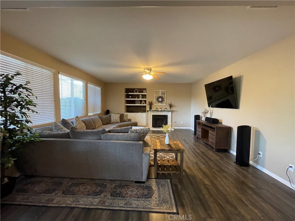 42249 CLAIRISSA Way Murrieta, CA 92562 - Photo 26 of 47 a living room with furniture and a flat screen tv