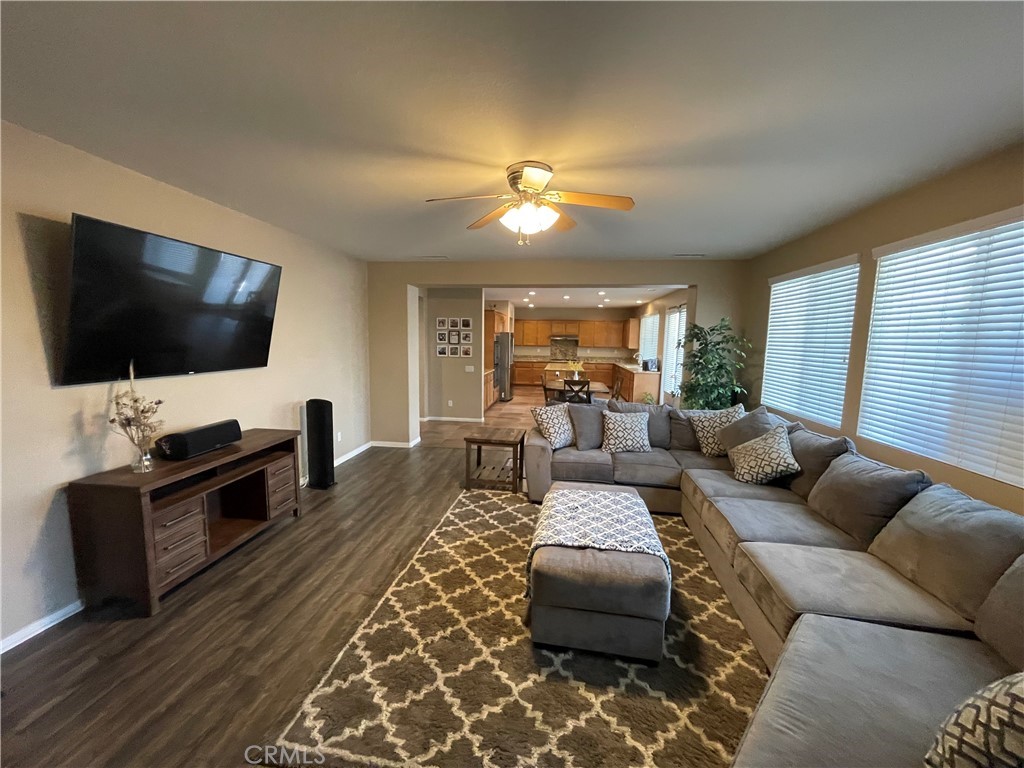 42249 CLAIRISSA Way Murrieta, CA 92562 - Photo 28 of 47 a living room with furniture and a flat screen tv