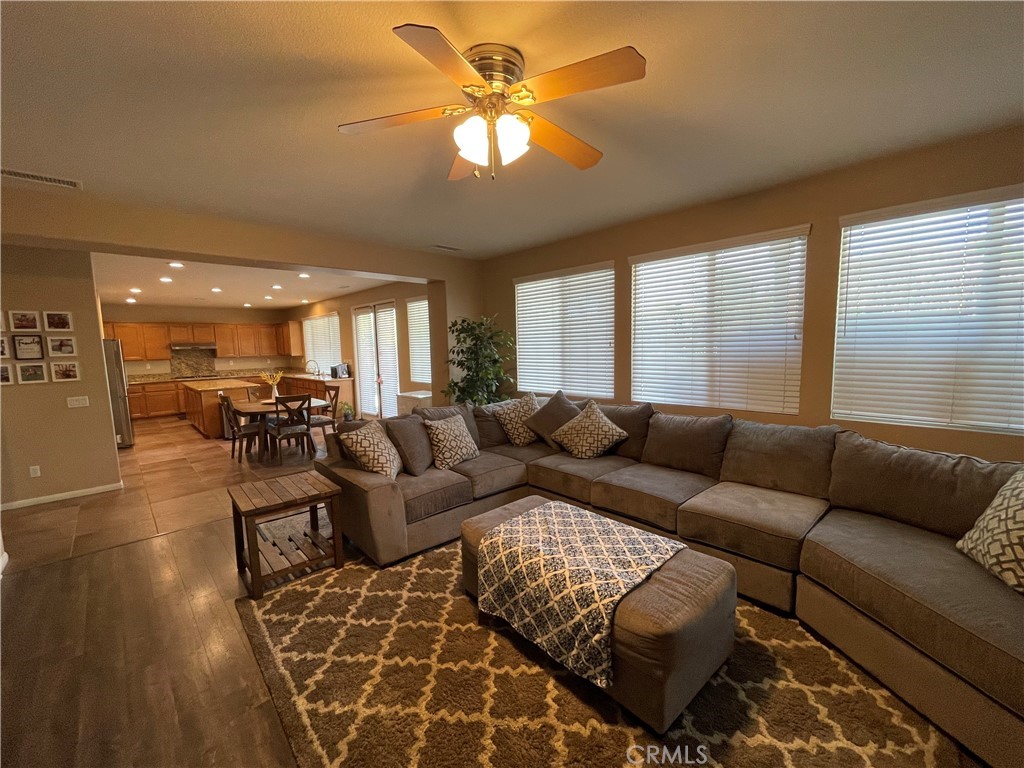 42249 CLAIRISSA Way Murrieta, CA 92562 - Photo 29 of 47 a living room with furniture and a large window