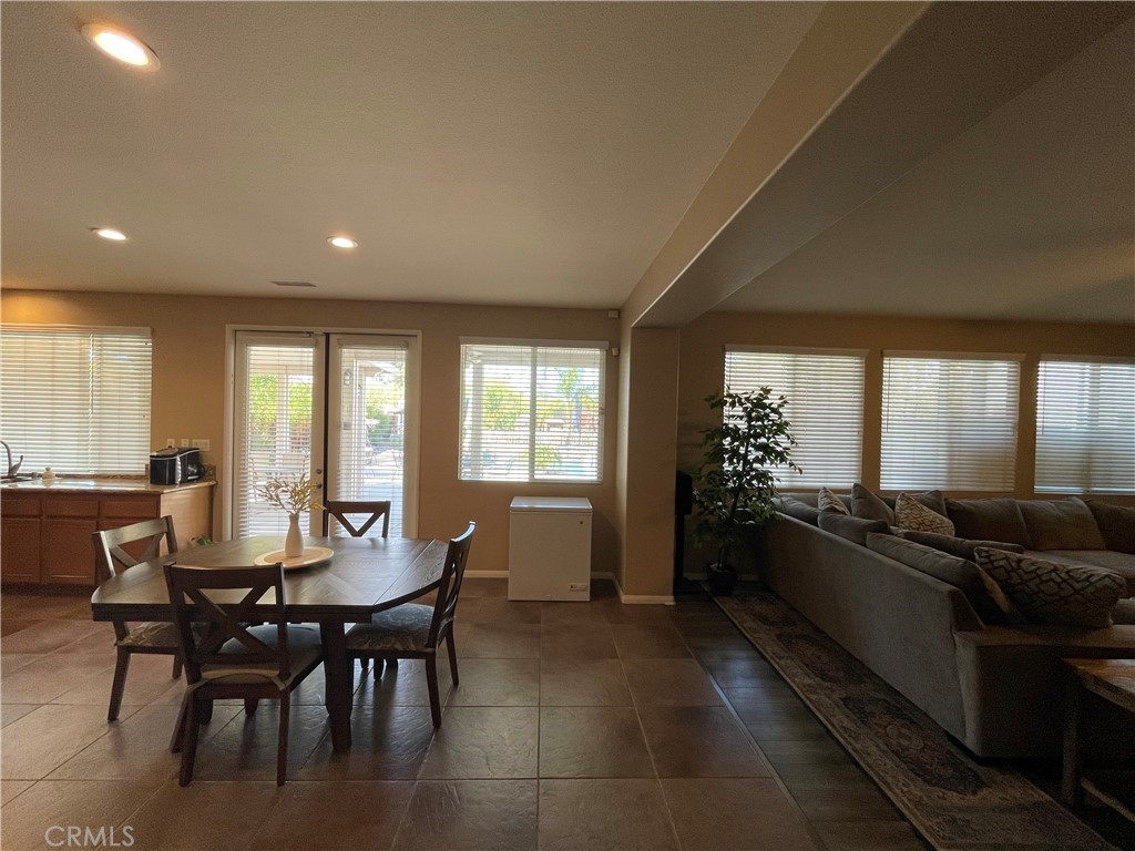 42249 CLAIRISSA Way Murrieta, CA 92562 - Photo 34 of 47 a living room with furniture and large windows