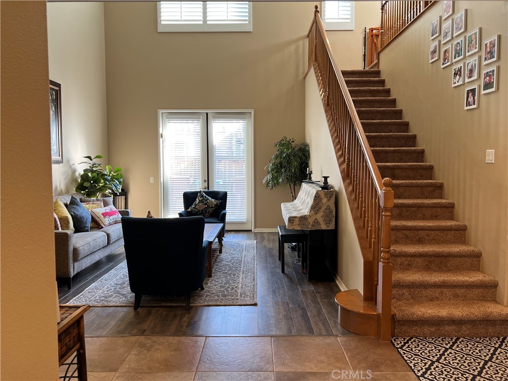 42249 CLAIRISSA Way Murrieta, CA 92562 - Photo 41 of 47 a living room with furniture and a potted plant