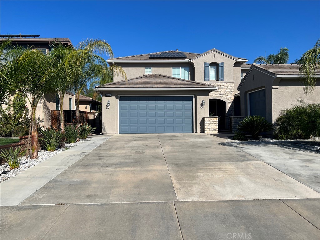 42249 CLAIRISSA Way Murrieta, CA 92562 - Photo 46 of 47 a front view of a house with a yard and garage
