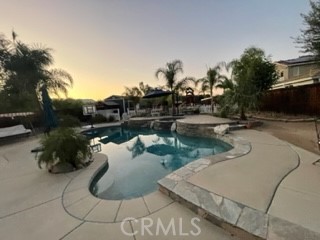 42249 CLAIRISSA Way Murrieta, CA 92562 - Photo 7 of 47 a view of a swimming pool with lounge chair