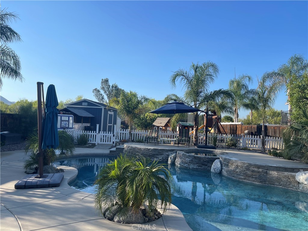 42249 CLAIRISSA Way Murrieta, CA 92562 - Photo 9 of 47 a view of a yard and a patio