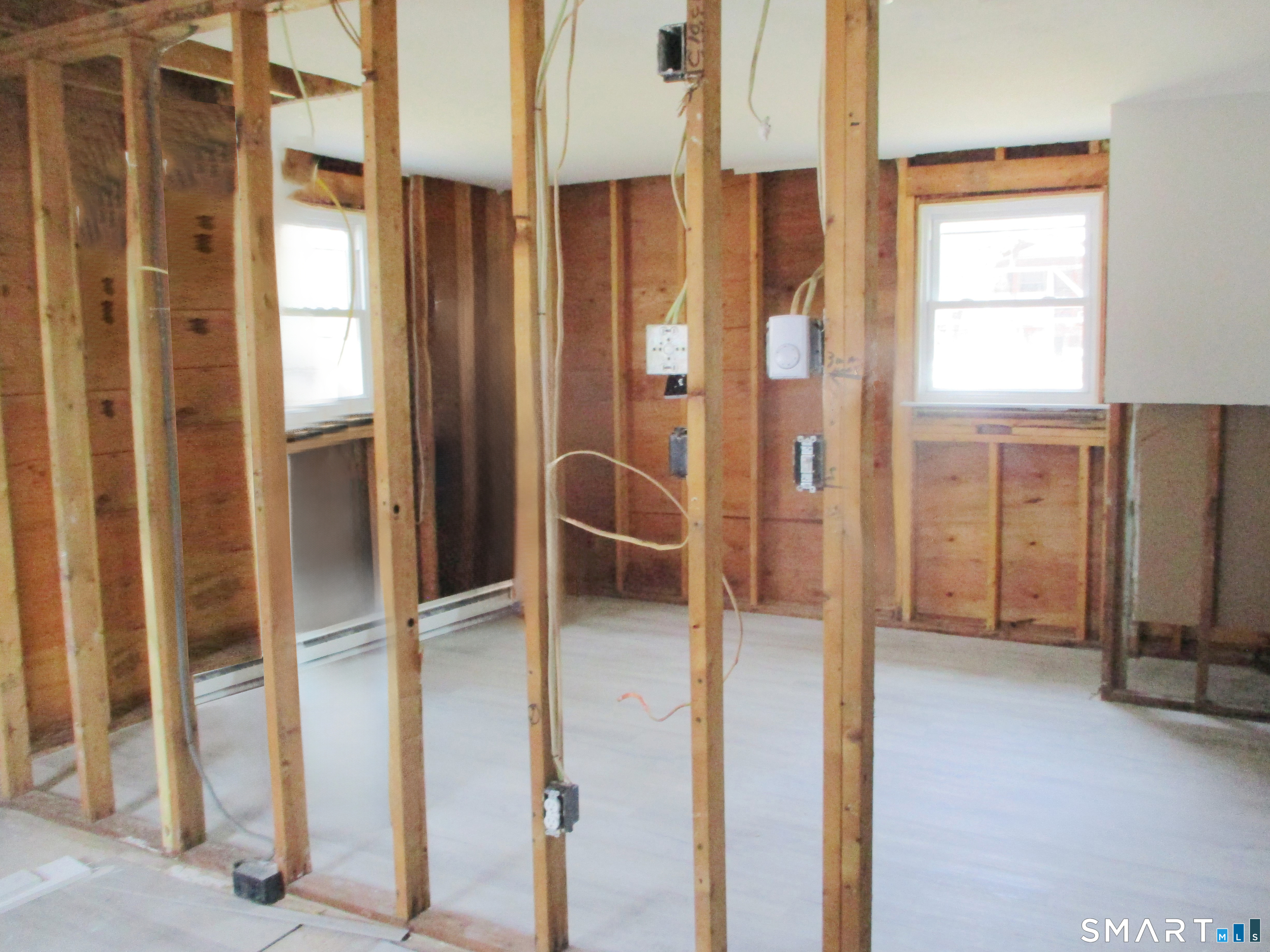 62 Rice Road East Windsor, CT 06016 - Photo 4 of 14 a view of an empty room with a window