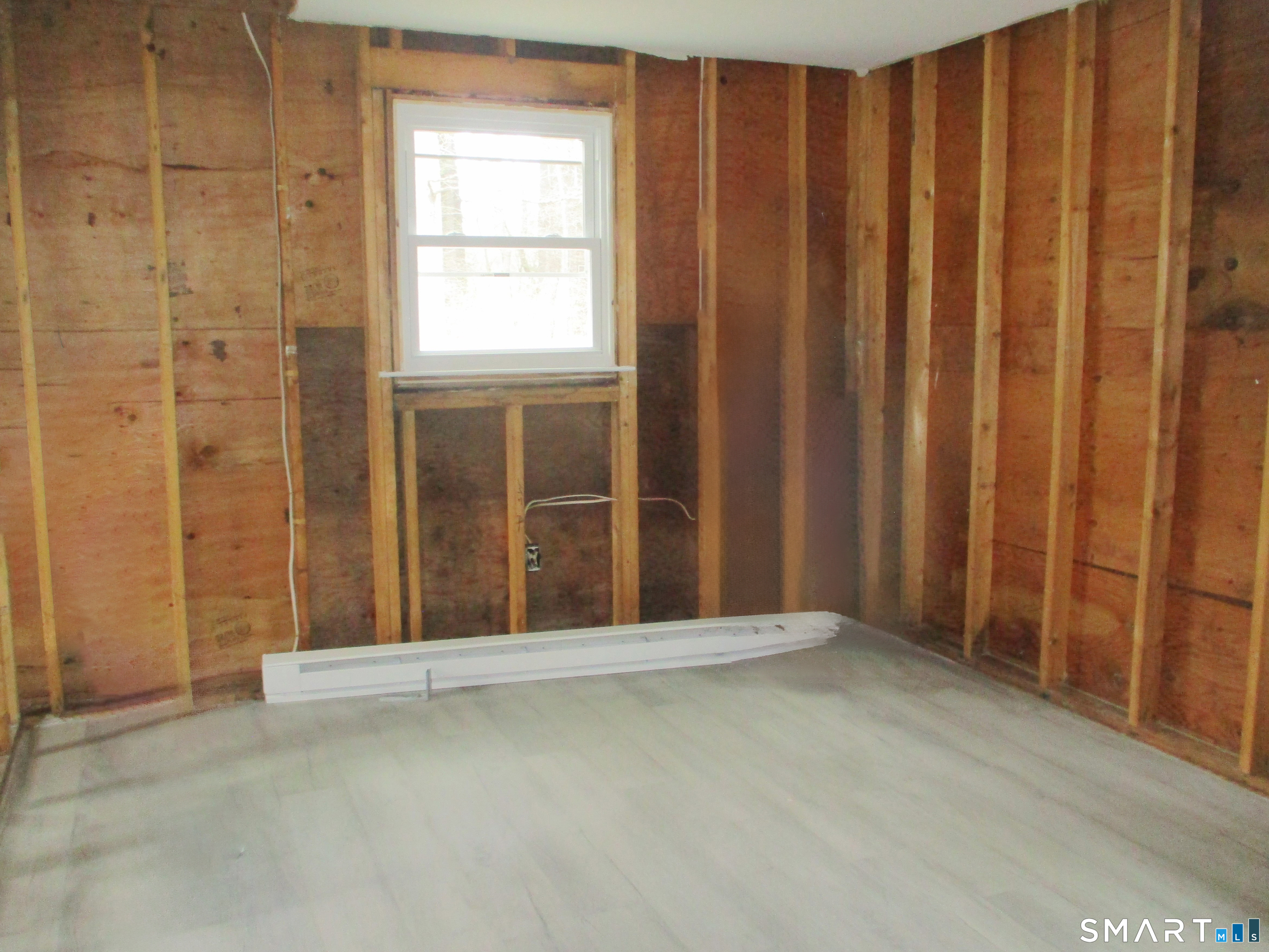 62 Rice Road East Windsor, CT 06016 - Photo 6 of 14 a view of an empty room with a window