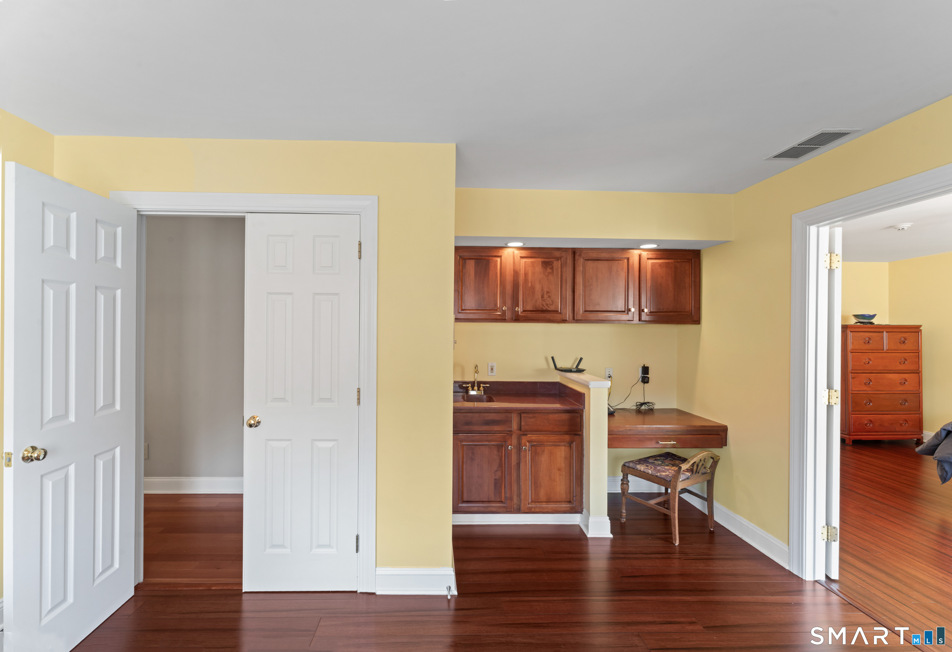 8 Cornerstone Court Ridgefield, CT 06877 - Photo 15 of 40 a view of a livingroom with furniture and wooden floor