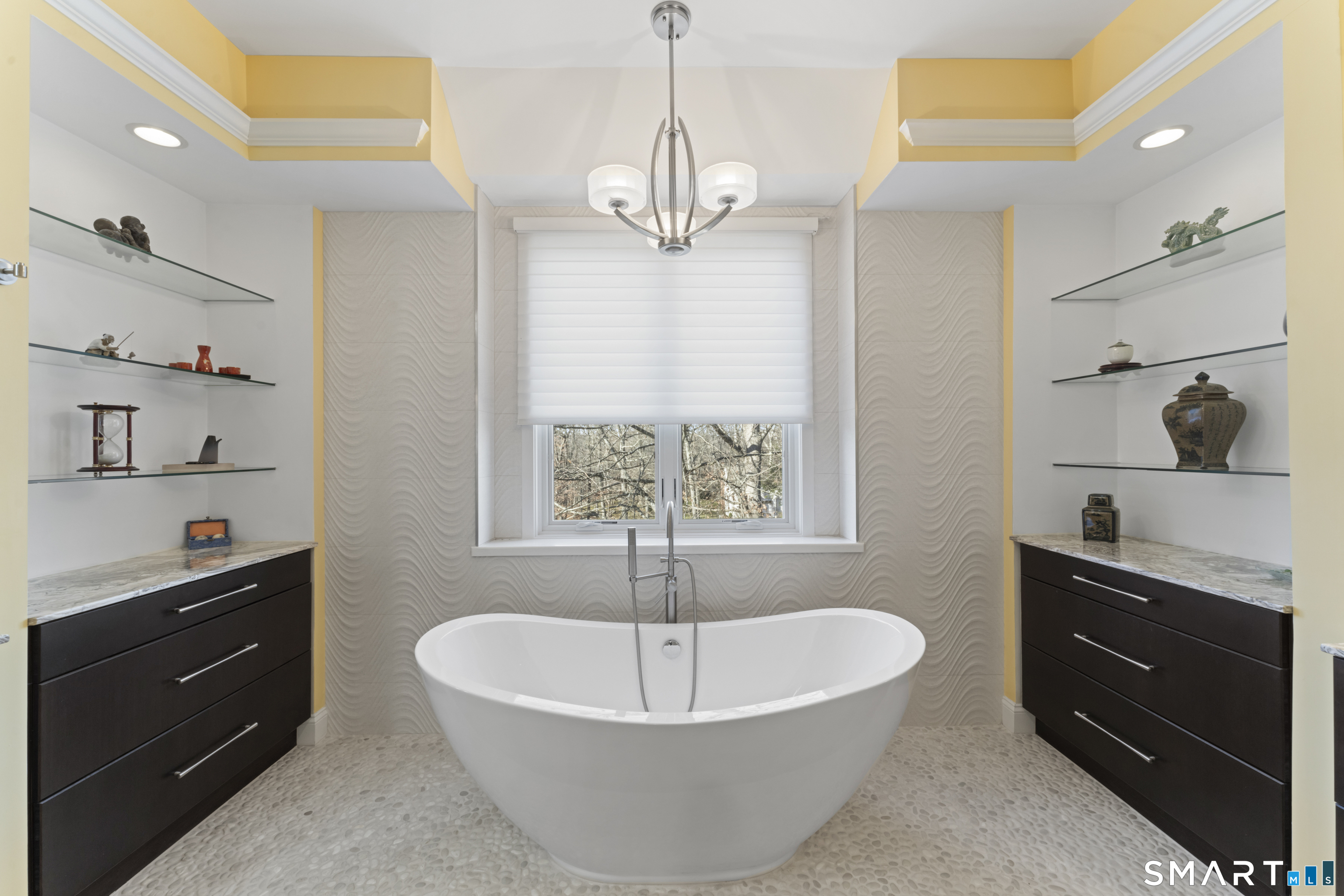 8 Cornerstone Court Ridgefield, CT 06877 - Photo 20 of 40 a spacious bathroom with a tub sink and mirror