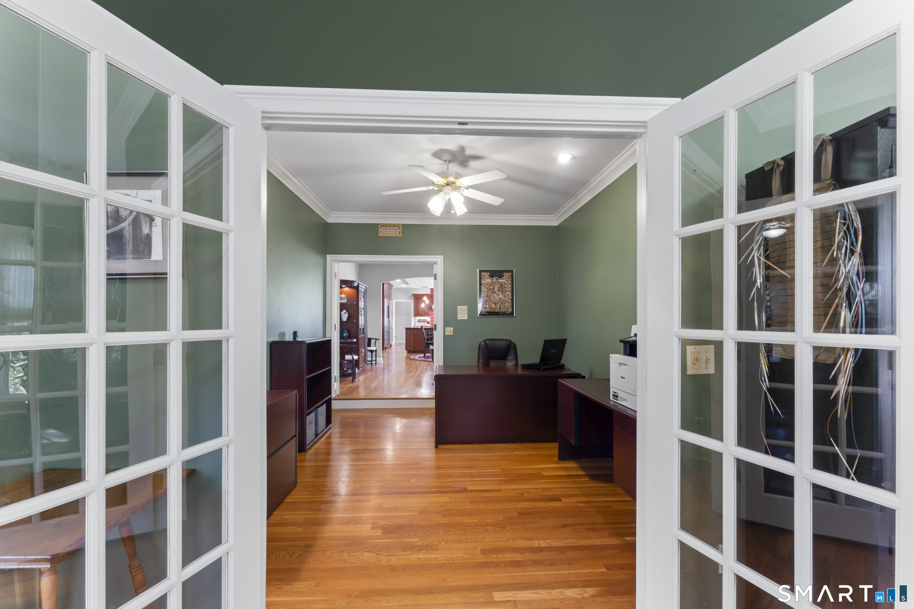 8 Cornerstone Court Ridgefield, CT 06877 - Photo 27 of 40 a view of a living room with furniture and windows