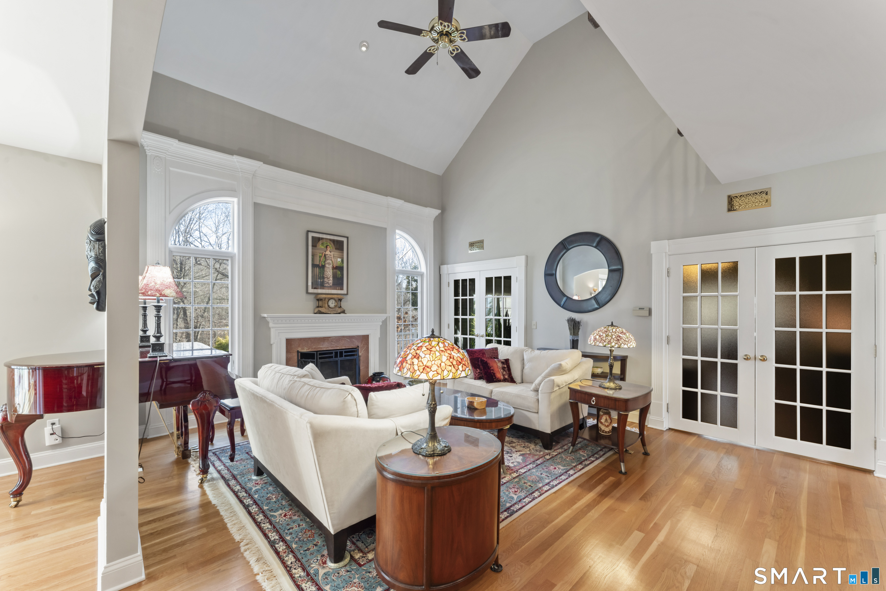 8 Cornerstone Court Ridgefield, CT 06877 - Photo 30 of 40 a living room with fireplace furniture and a large window