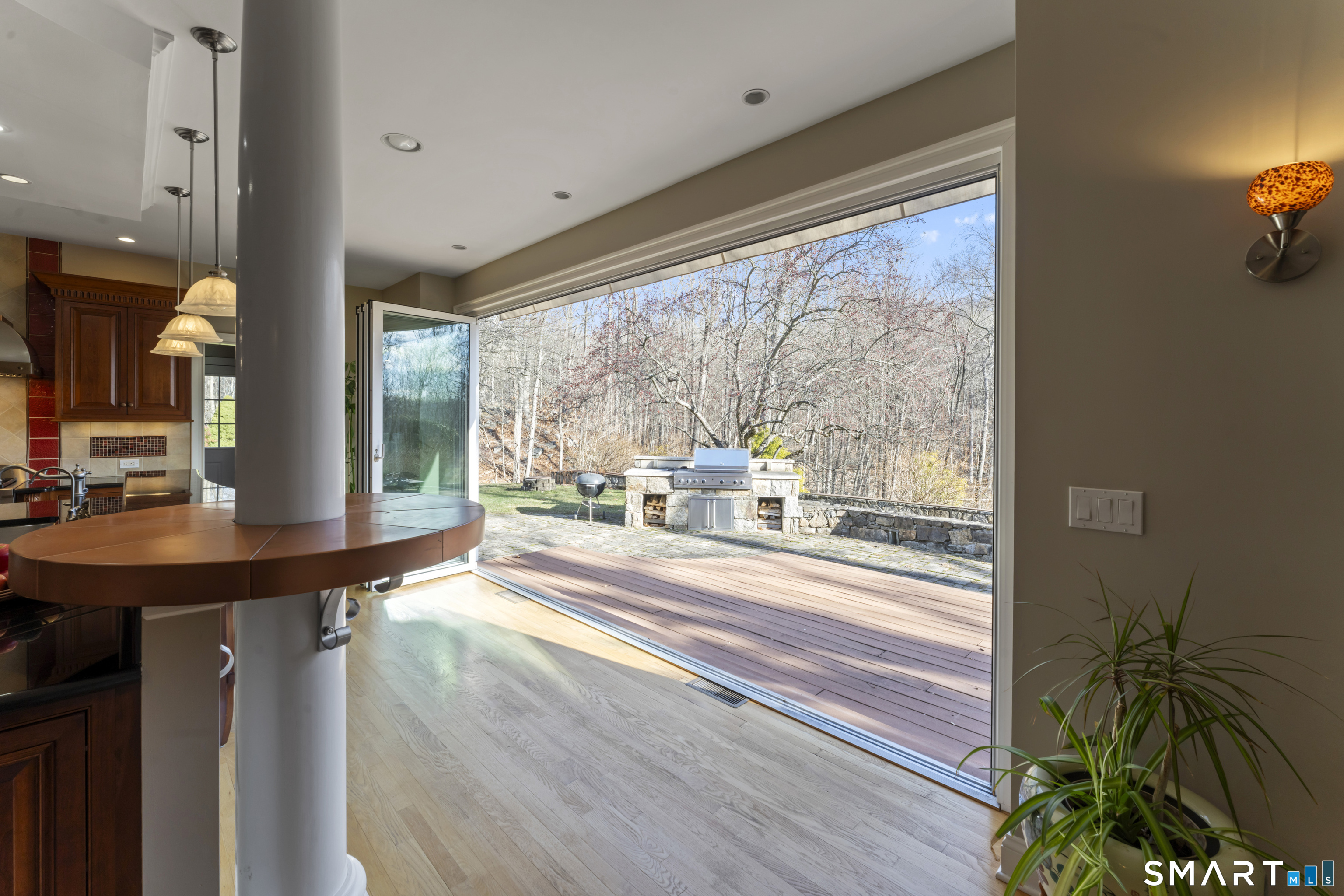8 Cornerstone Court Ridgefield, CT 06877 - Photo 35 of 40 a room with a large window and furniture