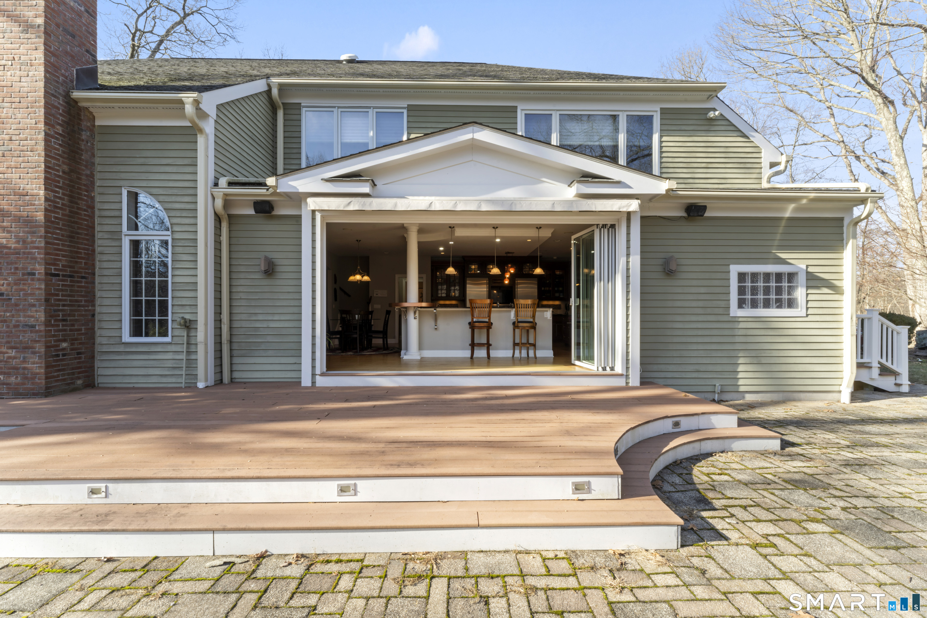 8 Cornerstone Court Ridgefield, CT 06877 - Photo 36 of 40 a view of a house with a patio