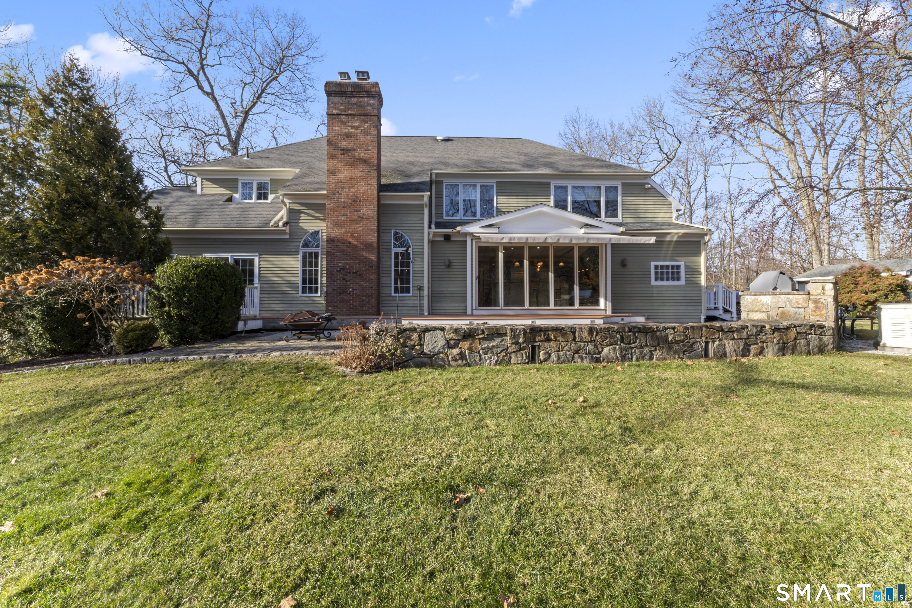 8 Cornerstone Court Ridgefield, CT 06877 - Photo 37 of 40 a front view of a house with a yard