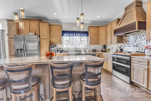 a kitchen with a sink and appliances