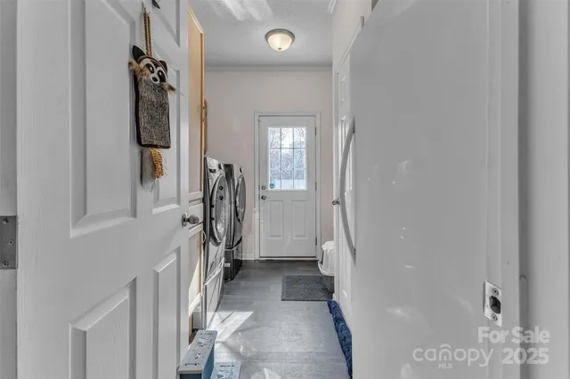 a view of entryway with wooden floor
