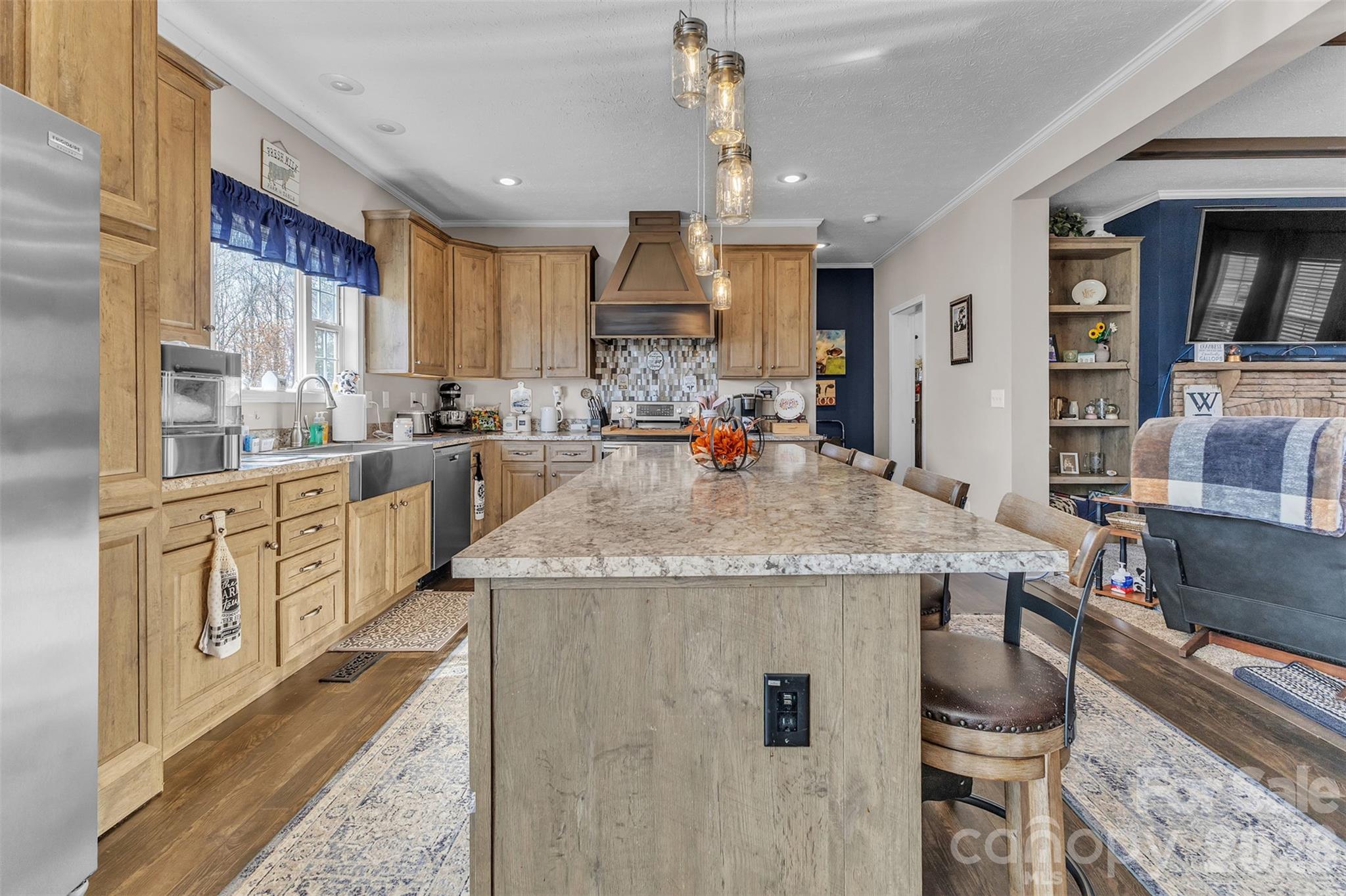 72 Crouch Road Taylorsville, NC 28681 - Photo 10 of 48 a kitchen with stainless steel appliances granite countertop a sink stove and refrigerator