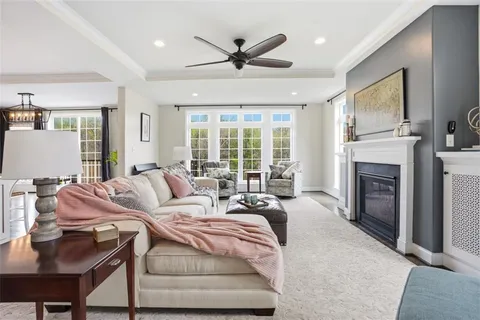 a view of a livingroom with furniture and a fireplace